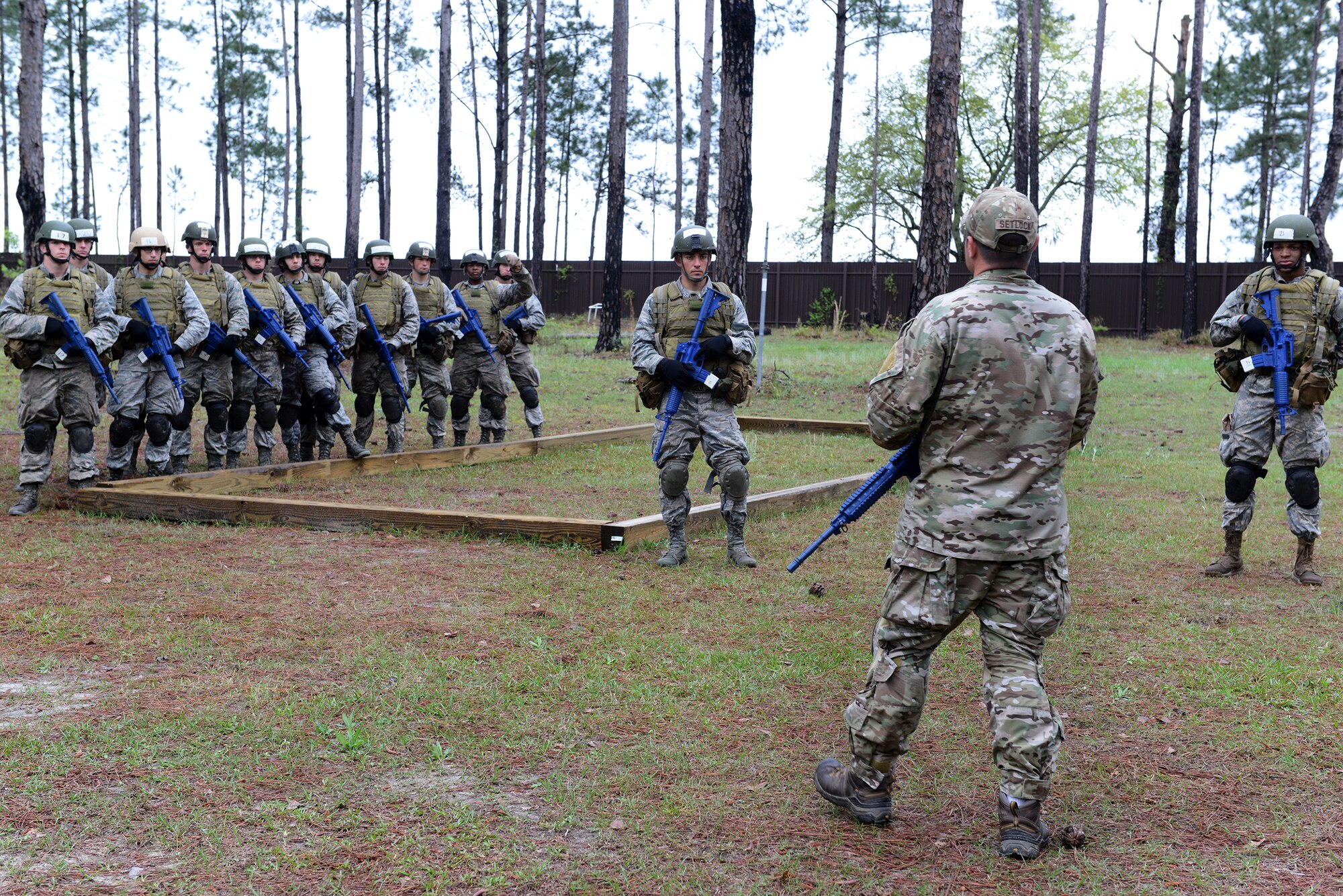 U.S. Air Force Master Sgt. Richard Setlock, 93d Air Ground Operations Wing tactical air control party superintendent, trains cadets before an exercise during the Air Liaison Officer Aptitude Assessment March 23, 2015, at Moody Air Force Base, Ga. The TACP candidates participated in a scenario using tactical movements during the assessment. (U.S. Air Force photo by Airman 1st Class Kathleen D. Bryant/Released)