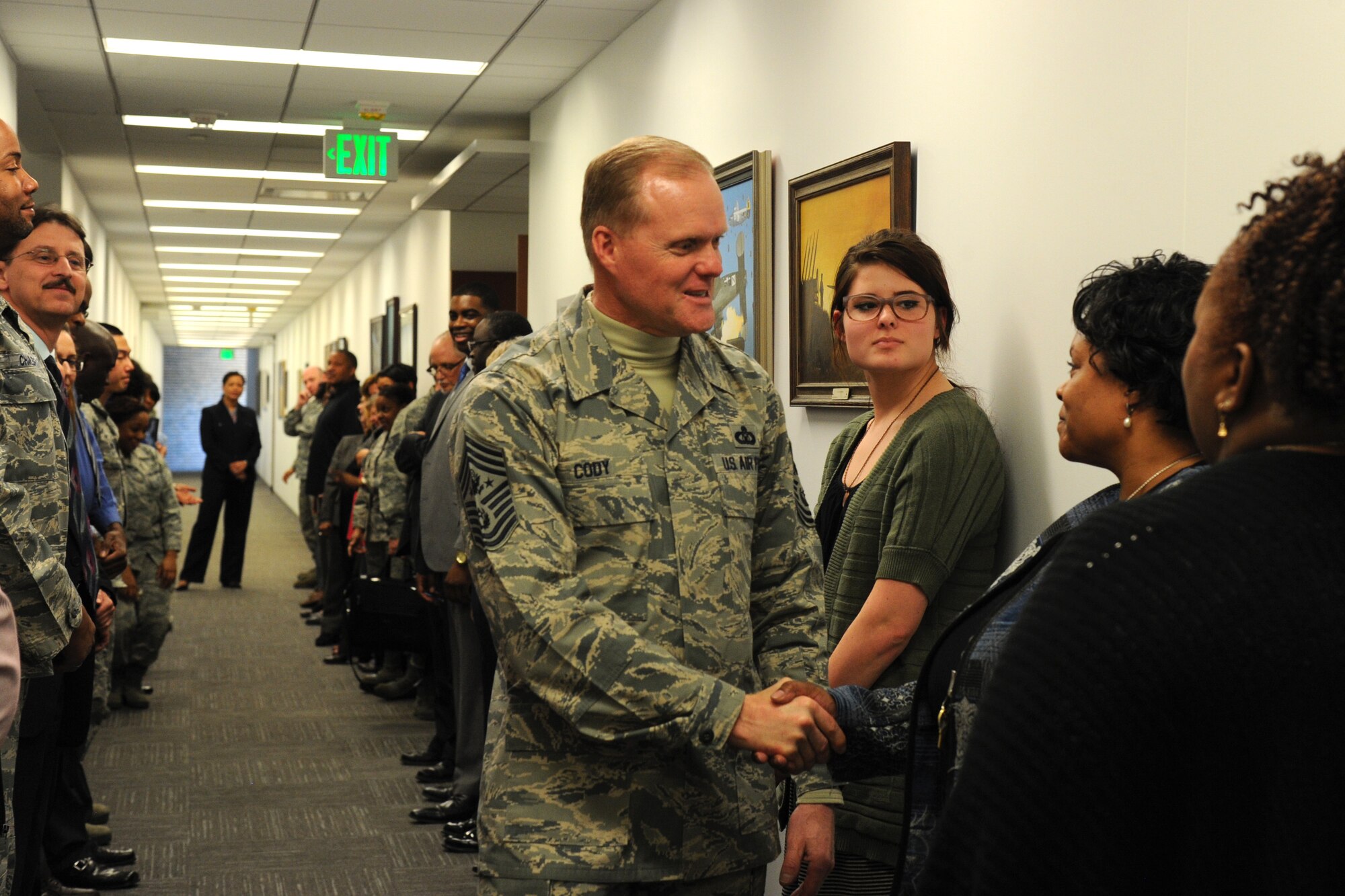 Chief Master Sgt. of the Air Force James Cody thanks Air Force District of Washington Comptroller directorate Airmen for their hard work during his visit with at Joint Base Andrews, Md., March 23, 2015. AFDW is a direct reporting unit to Headquarters Air Force, reporting to the Chief of Staff of the Air Force. (U.S. Air Force photo/Master Sgt. Tammie Moore)