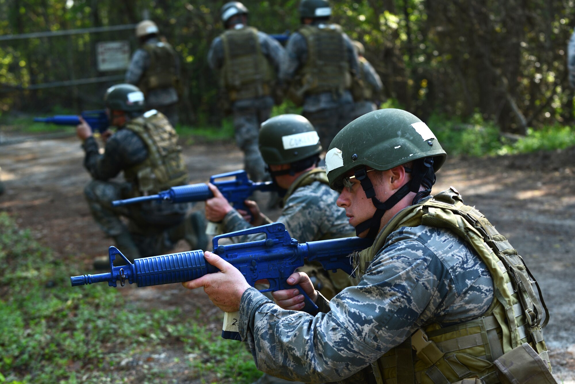 U.S. Air Force Reserve Officers’ Training Corps Cadet Alex Moyer, Montana State University tactical air control party candidate, scans for enemies during the Air Liaison Officer Aptitude Assessment tactical training March 21, 2015, at Moody Air Force Base, Ga. Airmen from the 23d Security Forces Squadron simulated ambushes to make the exercise more realistic. (U.S. Air Force photo by Airman 1st Class Kathleen D. Bryant/Released)