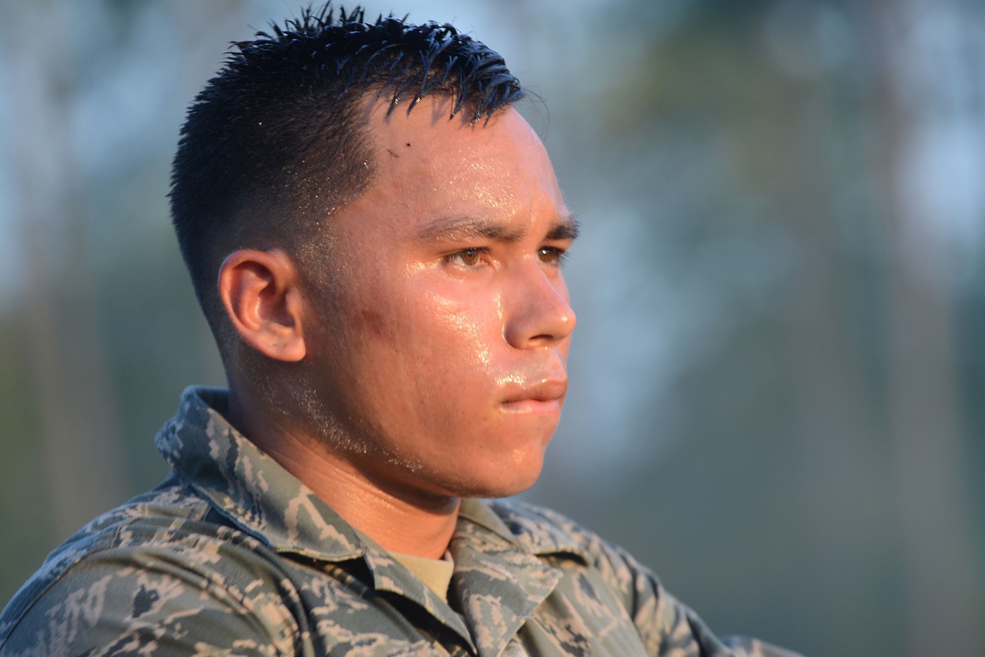 U.S. Air Force Reserve Officers’ Training Corps Cadet Christopher Dayao, University of Central Florida tactical air control party candidate, rests after completing a 4-mile ruck march during the Air Liaison Officer Aptitude Assessment March 21, 2015, at Moody Air Force Base, Ga. Moody held the entry-level TACP assessment for five days. (U.S. Air Force photo by Airman 1st Class Kathleen D. Bryant/Released)