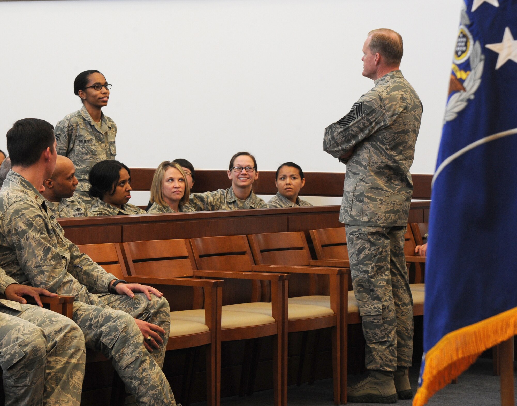 Chief Master Sgt. of the Air Force James Cody listens to a question asked by Staff Sgt. Lanina Reliford during his visit at Joint Base Andrews, Md., March 23, 2015. Reliford is assigned to the 11th Comptroller Squadron. (U.S. Air Force photo/Master Sgt. Tammie Moore)