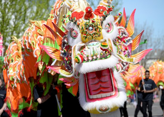 The "Hong Wan Lung" Dragon dances during the Bok Kai Festival in Marysville, Calif., Mar. 21, 2015. Members of Team Beale volunteered at the festival to bring the dragon to life. (U.S. Air Force photo by Staff Sgt. Robert M. Trujillo/Released)