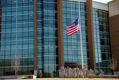 Airmen from the Air Force District of Washington gather to retire a flag during a retreat ceremony in front of the William A. Jones III Building on Joint Base Andrews, Md. March 23, 2015. Flags are properly honored and retired when they are no longer fit to be on display. (U.S. Air Force photo/Michael Martin)