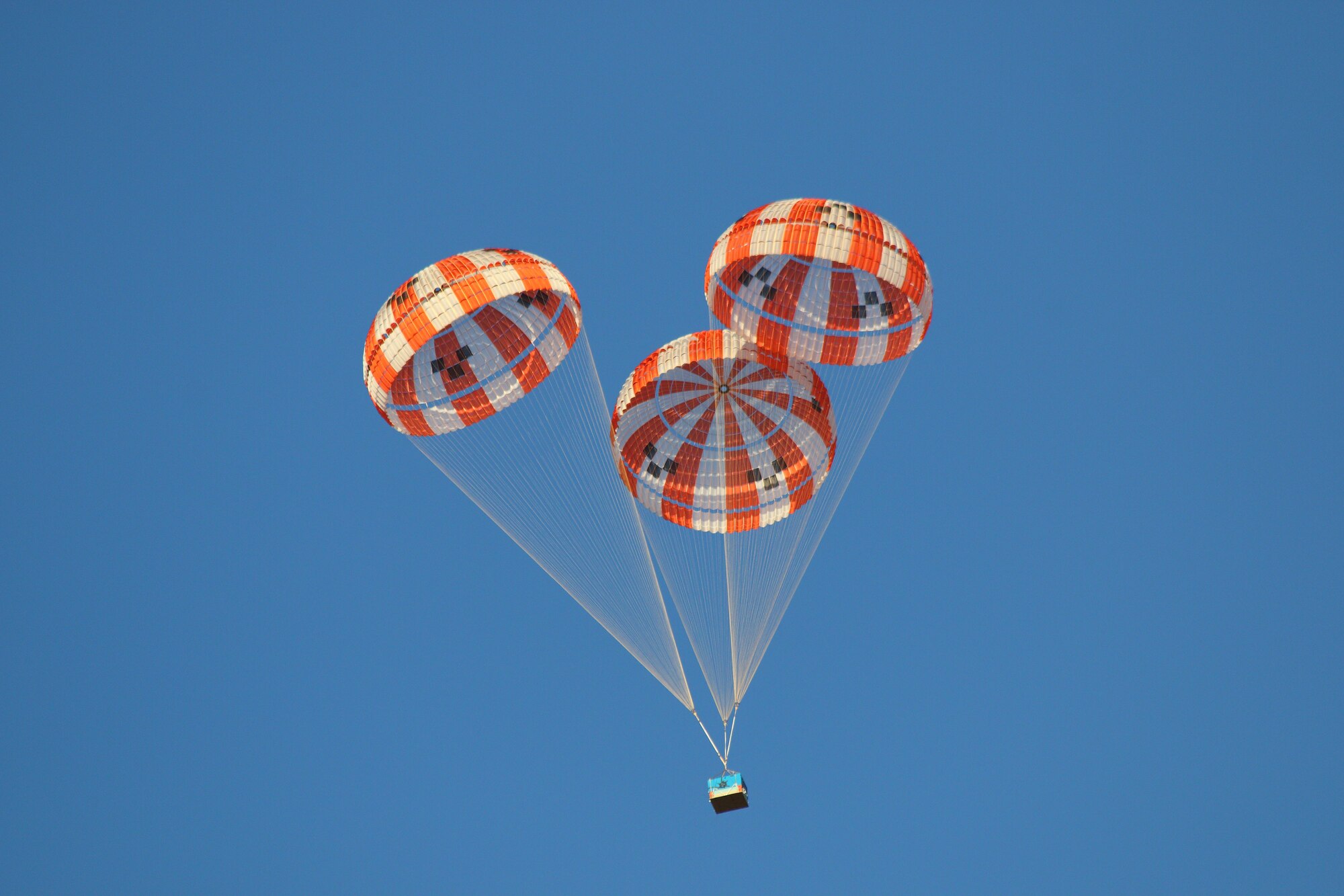 On Feb. 2 in Eloy, Ariz., engineers performed air drop testing on sub-scale parachutes for the NASA Orion spacecraft. The test is meant to determine which parachute configuration will ensure the Orion lands safely after missions. (Photo credit: NASA)