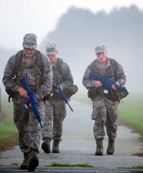 U.S. Air Force tactical air control party candidates participate in a ruck march during the Air Liaison Officer Aptitude Assessment March 21, 2015, at Moody Air Force Base, Ga. Candidates had to complete the 4-mile run in under an hour. The ruck march, as well as other week-long assessments, will be evaluated to see if candidates pass or fail during the final day of the assessment. (U.S. Air Force photo by Airman Greg  Nash/Released)