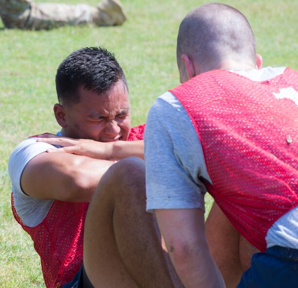 U.S. Air Force Reserve Officers’ Training Corps Cadet Christopher Dayao, University of Central Florida tactical air control party candidate, performs sit-ups during the Air Liaison Officer Aptitude Assessment March 21, 2015, at Moody Air Force Base, Ga. Candidates participated in the physical ability and stamina test, which standards align with the minimum requirements for entry into the TACP career field. (U.S. Air Force photo by Airman Greg Nash/Released) 