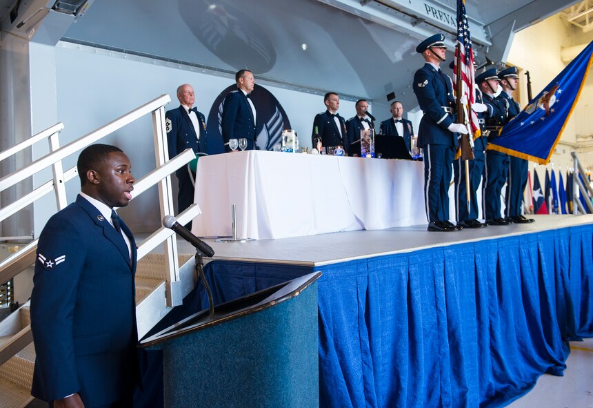 U.S. Air Force Airman 1st Class Antwaun Snipe, 23d Logistics Readiness Squadron, sings the national anthem during the 2nd Annual Dining-In March 20, 2015, at Moody Air Force Base, Ga. The dining-in is a formal military event that dates back to the 16th century. (U.S. Air Force photo by Airman 1st Class Ceaira Tinsley/Released)