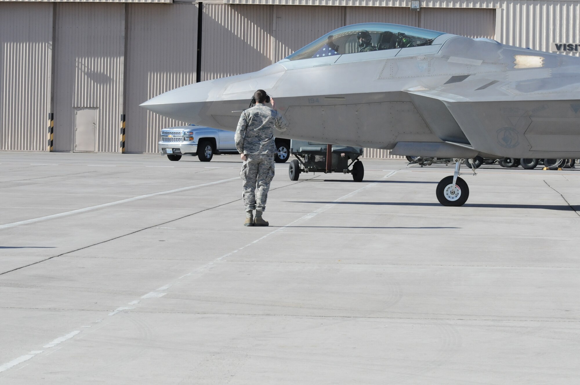 F-22A Raptor aircraft maintainers from the 192nd and 1st Fighter Wings, Langley Air Force Base, Va., participate in 40th anniversary of the Red Flag combat training exercise, Red Flag 15-1 at Nellis Air Force Base, Nev., Feb. 3, 2015.  Red Flag is a realistic combat training exercise designed to simulate the first few weeks of a major theater campaign involving air, space and cyber forces of the U.S. and its allies. It is conducted on the bombing and gunnery ranges on the Nevada Test and Training Range. (U.S. Air National Guard photo by Master Sgt. Carlos J. Claudio/Released)