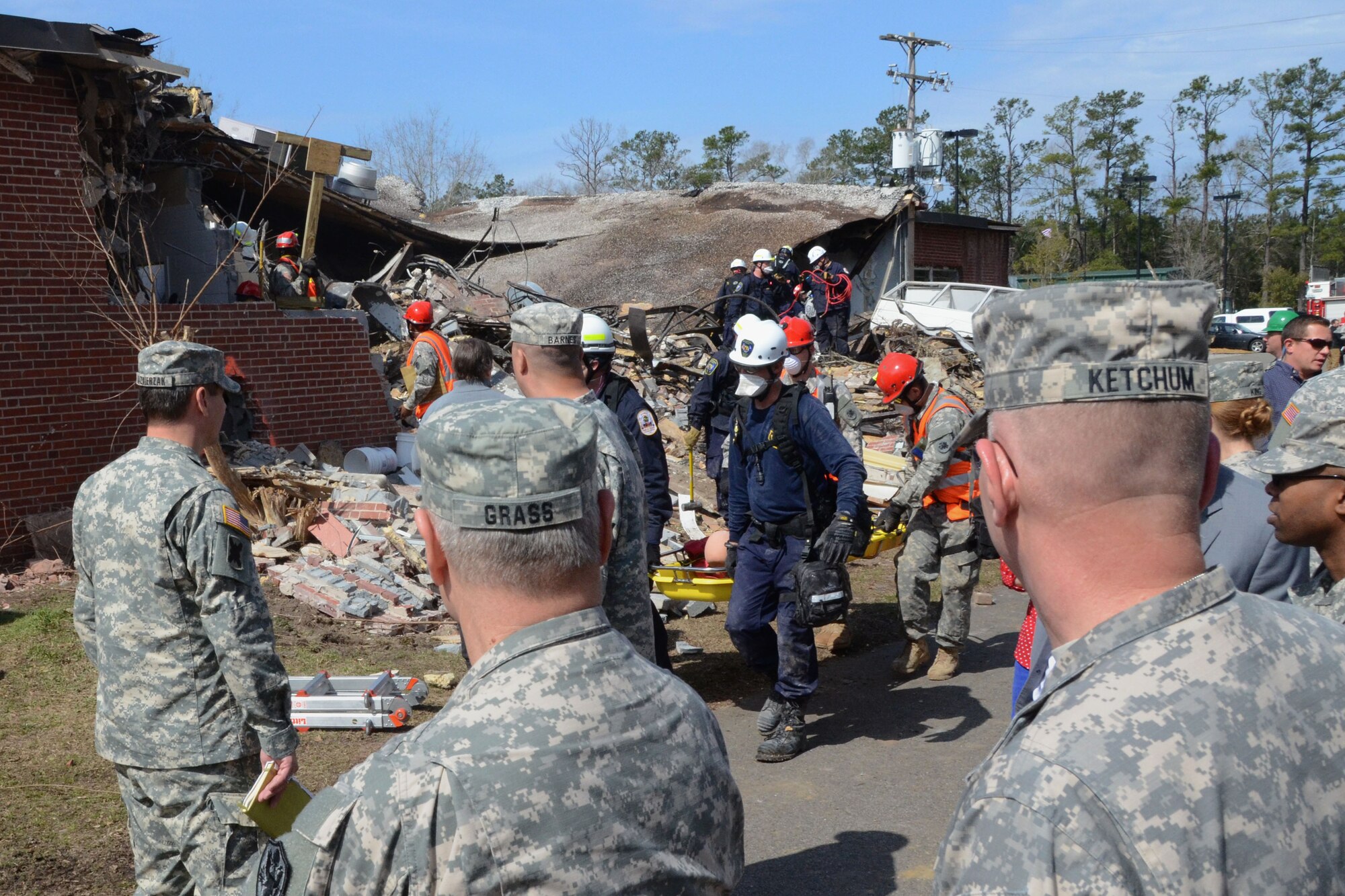 U.S. Army Gen. Frank J. Grass, Chief of the National Guard Bureau and a member of the Joint Chiefs of Staff, and distinguished visitors observe a simulated rescue and recovery operation, at Choppee Recreation Complex in Georgetown, S.C., during Vigilant Guard South Carolina, March 9, 2015. Vigilant Guard is a series of federally funded disaster-response drills conducted by National Guard units working with federal, state and local emergency management agencies and first responders. (U.S. Air National Guard photo by Airman 1st Class Ashleigh S. Pavelek/Released)