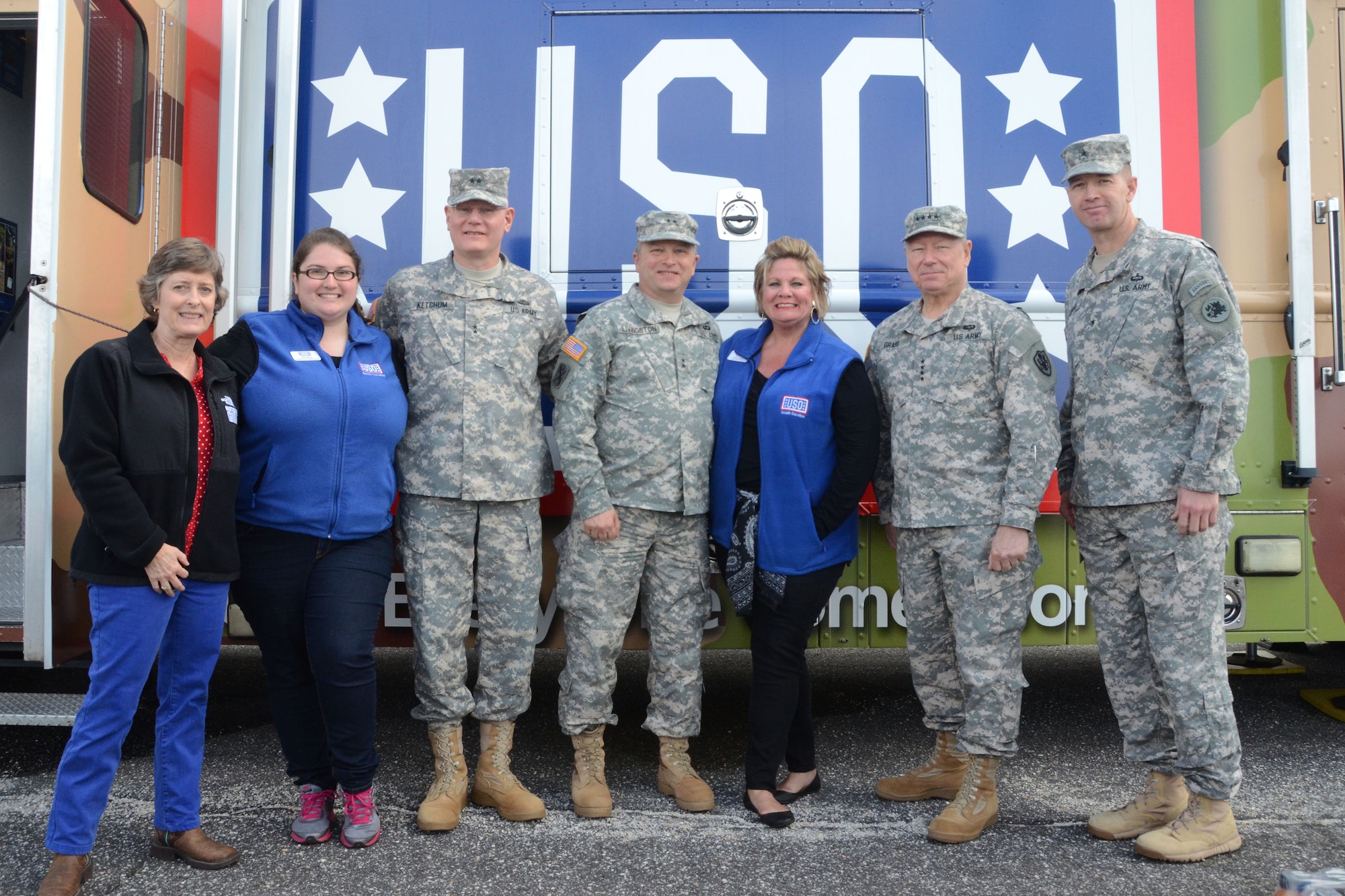 U.S. Army Gen. Frank J. Grass, Chief of the National Guard Bureau and a member of the Joint Chiefs of Staff, and distinguished visitors tour the United Service Organizations (USO) mobile canteen during Vigilant Guard South Carolina at the Georgetown Airport in Georgetown, S.C., March 9, 2015. Vigilant Guard is a series of federally funded disaster-response drills conducted by National Guard units working with federal, state and local emergency management agencies and first responders. (U.S. Air National Guard photo by Airman 1st Class Ashleigh S. Pavelek/Released)