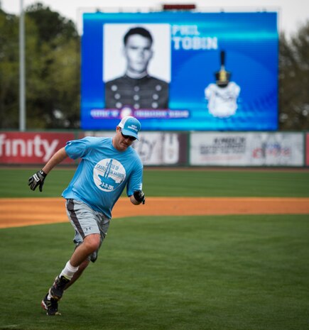 A member of the Citadel 1990 College World Series baseball team runs the bases during the “Battle of Charleston Harbor” softball tournament March 21, 2015, at Joe Riley Stadium in Charleston, S.C. The “Battle of Charleston Harbor” was a softball game between the Wounded Warrior Amputee Softball Team and the Citadel 1990 College World Series baseball team. (U.S. Air Force photo/Airman 1st Class Clayton Cupit)