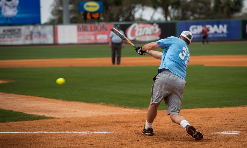 Scott Elvington, Citadel Alumni, hits a groundball during the “Battle of Charleston Harbor” softball tournament March 21, 2015, at Joe Riley Stadium in Charleston, S.C. The “Battle of Charleston Harbor” was a softball game between the Wounded Warrior Amputee Softball Team and the Citadel 1990 College World Series baseball team. (U.S. Air Force photo/Airman 1st Class Clayton Cupit)