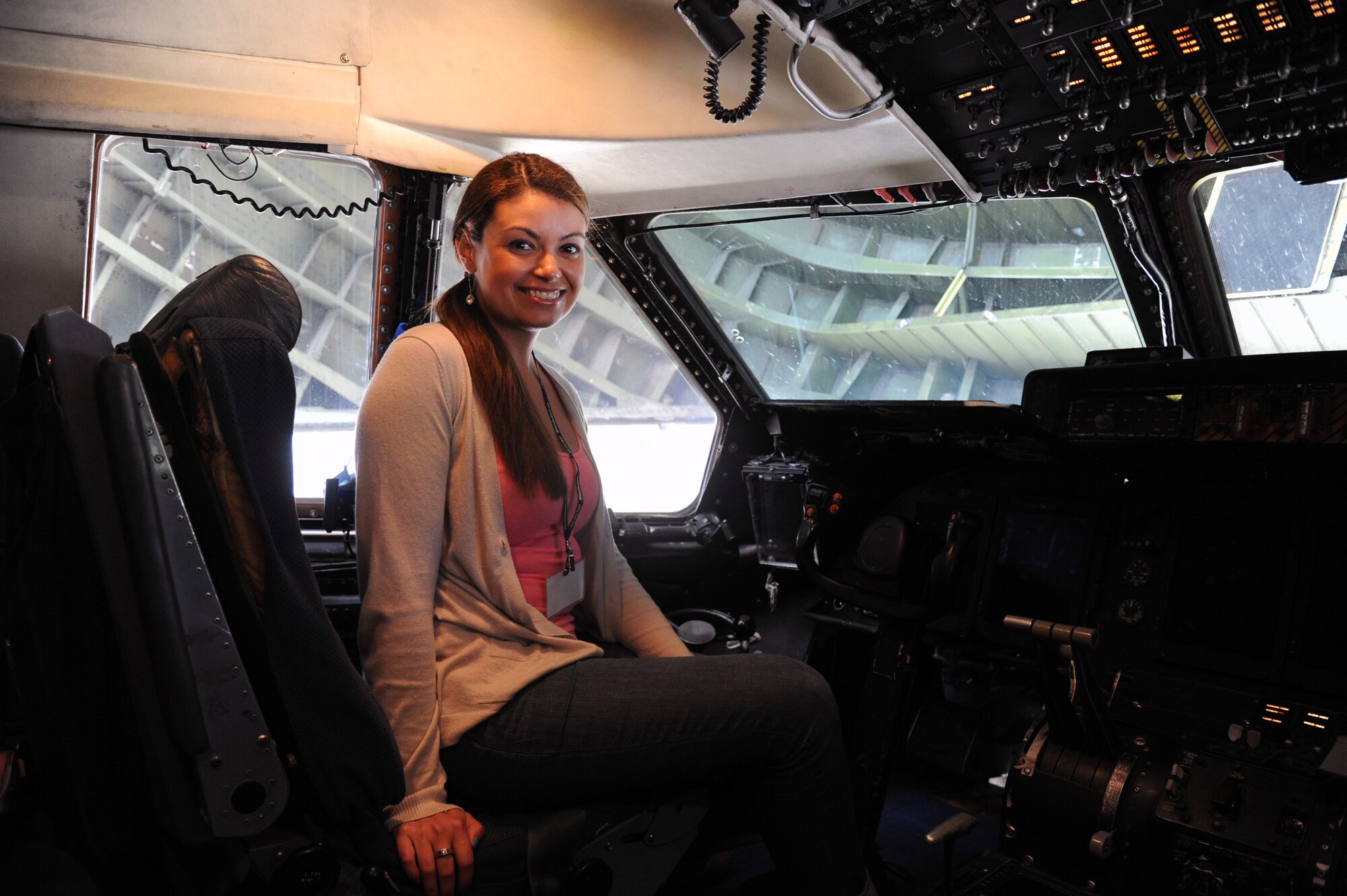Christen Burden a branch supervisor with Grow Financial, logs some C-5 flight deck time during a 927th Air Refueling Wing, MacDill Air Force base, Fla., sponsored civic leader trip to the 433rd Airlift Wing, Joint Base San Antonio, March 19-20. Civic leader trips increase awareness of how the Air Force Reserve contributes to the total force and the importance of the 927th Air Refueling Wing to the local economy. (U.S. Air Force photo/Tech. Sgt. Peter Dean)