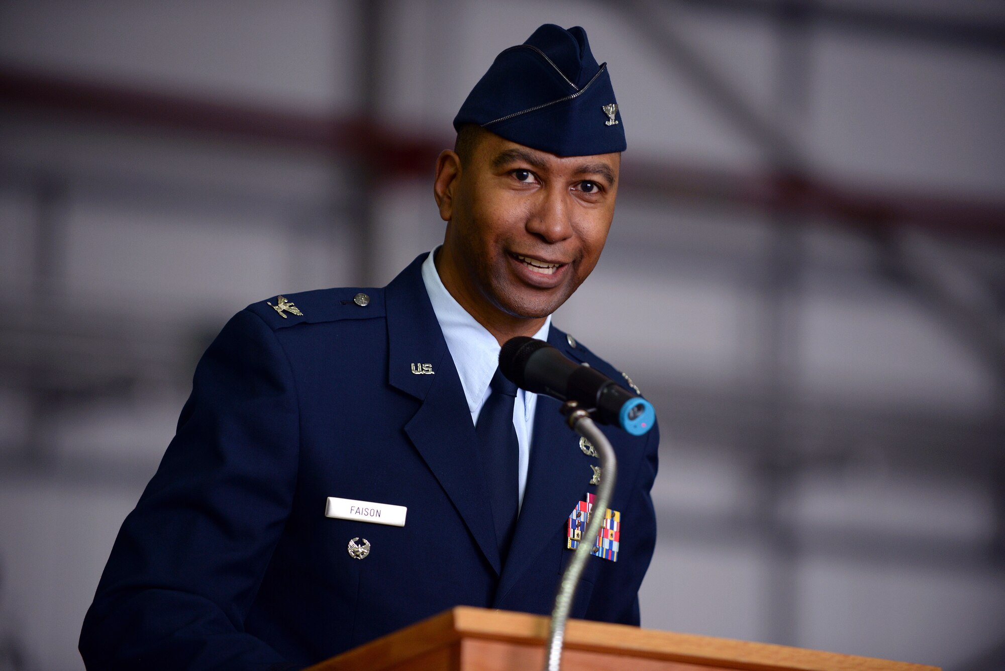 U.S. Air Force Col. Eric Faison, 352nd Special Operations Maintenance Group commander, speaks during the 352nd Special Operations Wing activation ceremony March 23, 2015, on RAF Mildenhall, England. (U.S. Air Force photo by Senior Airman Christine Griffiths)

