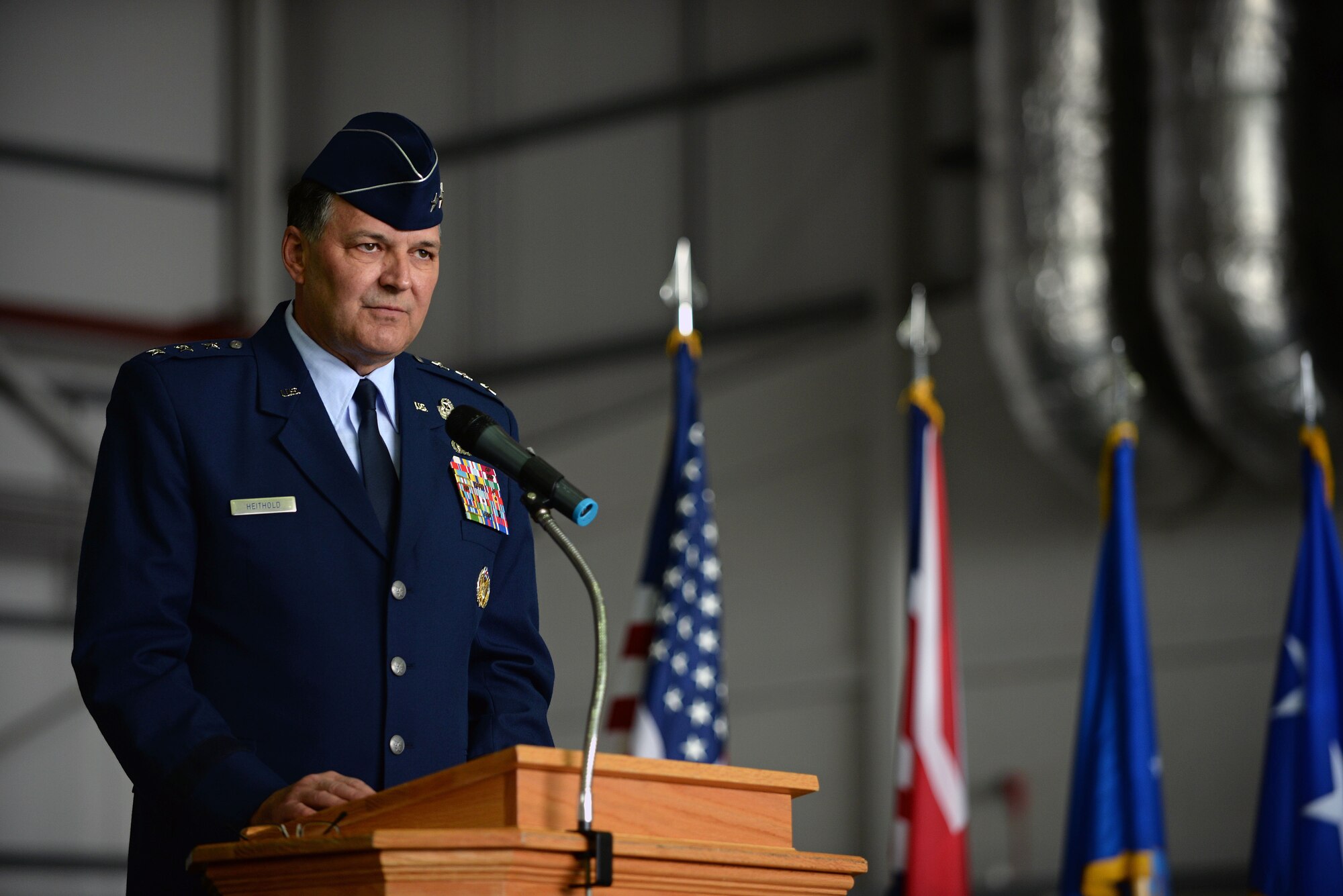 U.S. Air Force Lt. Gen. Brad A. Heithold, Air Force Special Operations Command commander, speaks during the 352nd Special Operations Wing activation ceremony March 23, 2015, on RAF Mildenhall, England. The 352nd SOW is comprised of more than 1,200 active-duty and civilian Airmen performing missions on MC-130J Commando II and CV-22B Osprey aircraft for AFSOC. (U.S. Air Force photo by Senior Airman Christine Griffiths)
