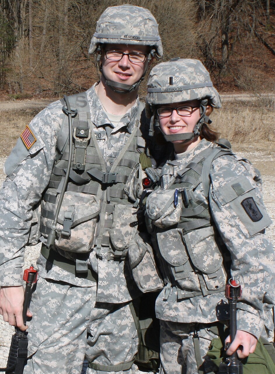 Married Army medics 1st Lt. Grant Restuccio and 1st Lt. Ashley Restuccio prepare for the land navigation course in Vilseck, Germany. The spouses are competing together to earn the prestigious Expert Field Medical Badge. U.S. Army photo by Capt. Robert Gallimore