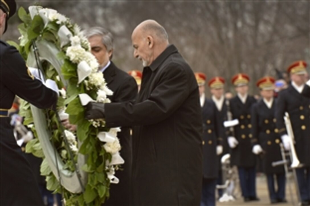 Afghan President Ashraf Ghani lays a wreath at the Tomb of the Unknown Soldier at Arlington National Cemetery in Arlington, Va., March 24, 2015. U.S. Defense Secretary Ash Carter and Vice President Joe Biden participated in the event.
