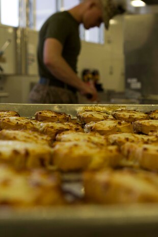 Three food service specialists took part in the Chef of the Quarter competition, March 12, 2015, inside the R.G. Robinson Mess Hall aboard Marine Corps Air Station Iwakuni, Japan. The quarterly event evaluates Marines on knowledge dealing with their Military Occupational Specialty, Mess Hall uniform regulations and ability to create a full course meal. Lance Cpl. Rebecca Messex won the competition after judges dubbed her meal presentation the best.