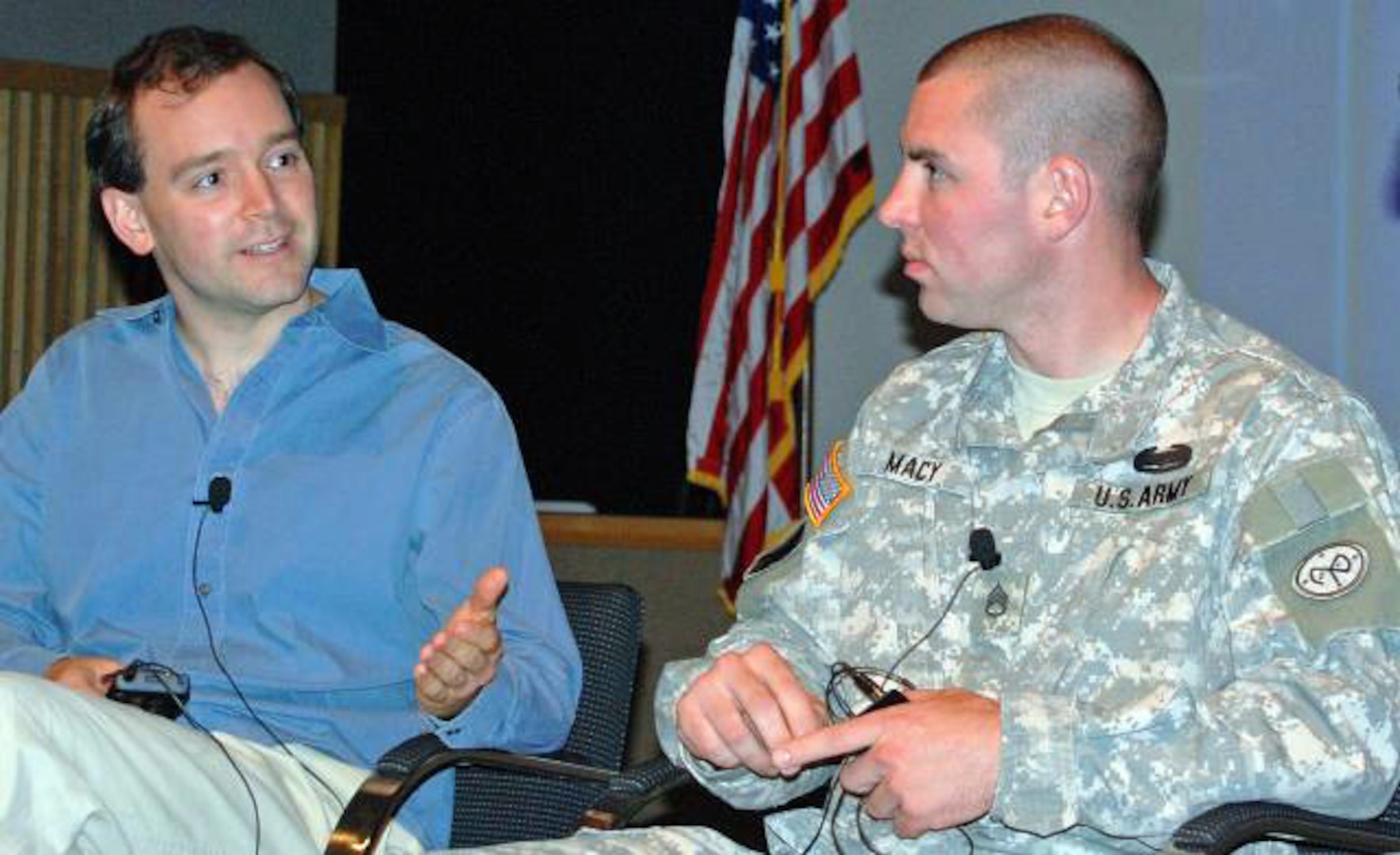 Producer and director Matthew O'Neill talks about his film "Baghdad ER" at the New York State Museum with Staff Sergeant Craig Macy, a wounded New York Army National Guard Soldier who appears in the film. Macy joined O'Neill for a special showing of his film at the museum on July 1, 2010, in conjunction with the Citizen-Soldier exhibit hosted by the state museum. 