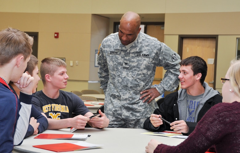 WINCHESTER, Va. - Col. Vincent V. Quarles, commander of U.S. Army Corps of Engineers, Middle East District, greets students from area high schools and shares his enthusiasm for engineering at the annual Day with an Engineer March 19 at Lord Fairfax Community College’s Middletown campus.