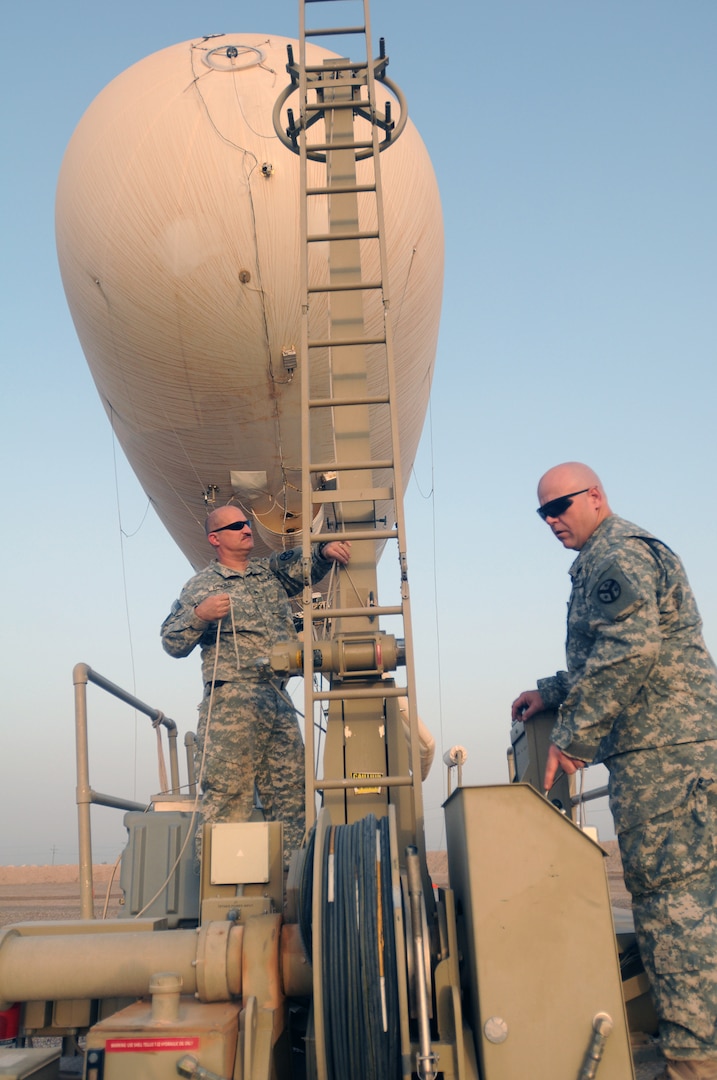 Sgt. Kenneth Arnold and Spc. Donald Neeley, both Aerostat blimp operators with B Troop, Regimental Troop Squadron of the Tennessee National Guard’s 278th Armored Cavalry Regiment, 103rd Sustainment Command (Expeditionary), launch the blimp at Contingency Operating Base Taji, Iraq June 28, 2010.