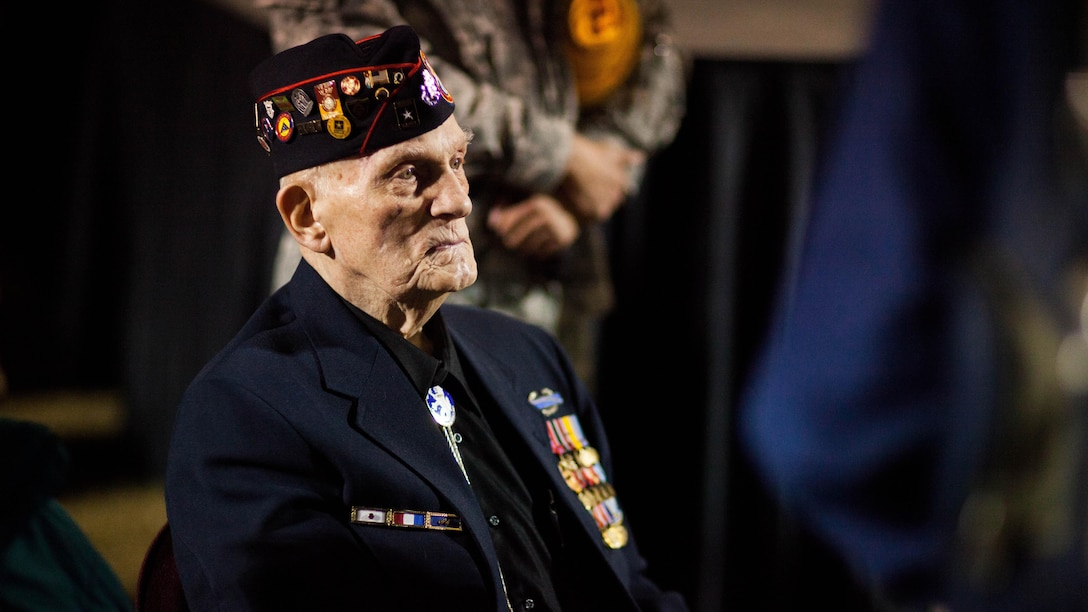William L. Eldridge, a Bataan Death March survivor, watches the opening ceremoniesthe 26th Annual Bataan Memorial Death March at White Sands Missile Range March 22. Eldridge was among the more than 60,000 Filipino prisoners of war, who endured the 60-mile long March in the Philippines April 1942.