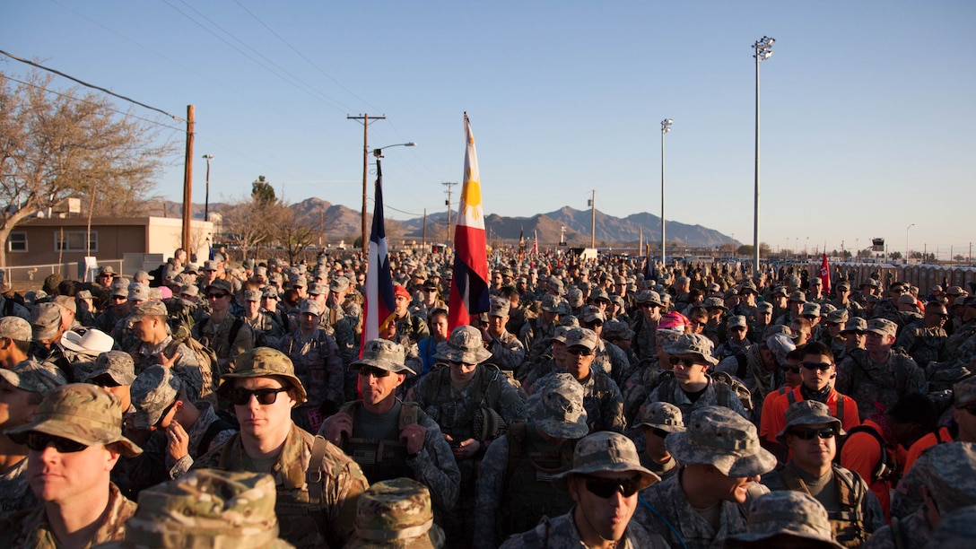 Marines, soldiers, sailors, coastguardsmen and airman marched 26.2 miles in the New Mexican desert during the 26th Annual Bataan Memorial Death March at White Sands Missile Range March 22.The event is the 73rd commemoration of the Bataan Death March when more than 60,000 American and Filipino prisoners of war endured a 60-mile forced march. 