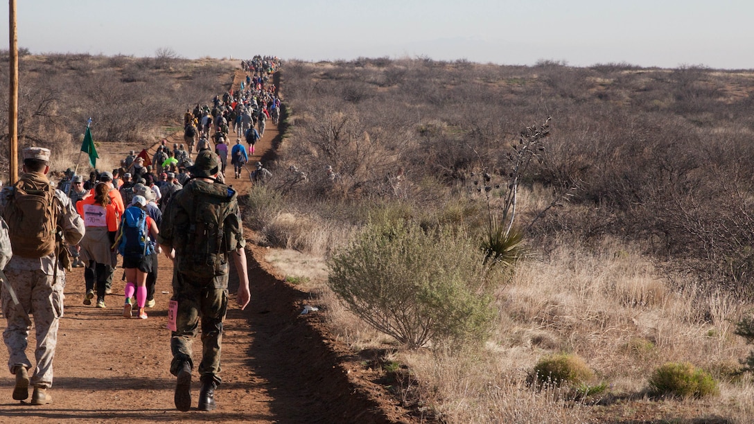 Marines, soldiers, sailors, coastguardsmen, airman and civilians marched 26.2 miles in the New Mexican desert during the 26th Annual Bataan Memorial Death March at White Sands Missile Range March 22. The event is the 73rd commemoration of the Bataan Death March when more than 60,000 American and Filipino prisoners of war endured a 60-mile forced march. 