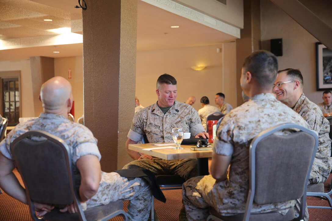 Sgt. Maj. Ryan W. Meltesen, battalion sergeant major, Combat Logistics Battalion 7, talks with his peers during a breakfast coordinated by members of the Active Duty Fund Drive at the Officer’s Club, March 23, 2015. The Navy-Marine Corps Relief Society is supported by the ADFD and is a critical source of NMCRS’ revenue. Marines and sailors of the Combat Center can continue to donate until April 17. The money that is donated will be given back to a Marine, sailor or their eligible dependents. (Official Marine Corps photo by Lance Cpl. Medina Ayala-Lo/Released)
