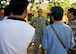 U.S. Air Force Senior Airman, Hoang Nguyen, 18th Civil Engineer Squadron water and fuel maintenance specialist, Kadena Air Base, Japan, speaks with Vietnam People's Army Air Defense members at South Tinh Phong Primary School, Quang Ngai Province, Vietnam, during a Operation Pacific Angel 15-3 event, March 23, 2015. Nguyen is deployed with more than 45 U.S. Army, Marines, Navy and Air Force to Vietnam to provide general health care and engineering repairs to help strengthen host nation and U.S. relations. (U.S. Air Force photo by Staff Sgt. Tong Duong/ Released)