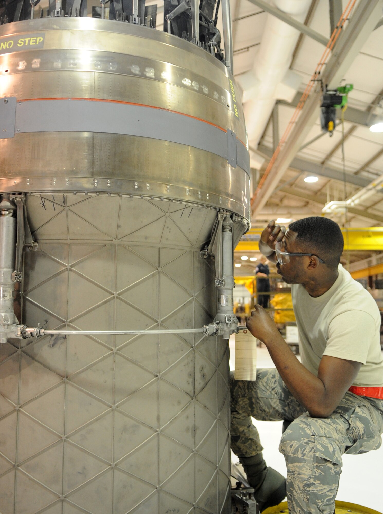 Airman 1st Class  Mitchell Dixon, 4th Component Maintenance Squadron aerospace propulsion journeyman, performs a five-level inspection on an F-15E Strike Eagle engine augmentor module , March 9, 2015, at Seymour Johnson Air Force Base, North Carolina. F-15E Strike Eagle engines in need of repairs are sent to the 4th CMS where Airmen such as Dixon break down four out of the five modules and perform any necessary maintenance before sending them back to the flightline. (U.S. Air Force photo/Senior Airman Ashley J. Thum)