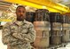 Airman 1st Class  Mitchell Dixon, 4th Component Maintenance Squadron aerospace propulsion journeyman, is pictured in the squadron’s back shop, March 9, 2015, at Seymour Johnson Air Force Base, North Carolina. Dixon channeled his passion for music into an audition for Tops in Blue, and will begin his assignment with the group in the spring of 2015. (U.S. Air Force photo/Senior Airman Ashley J. Thum)