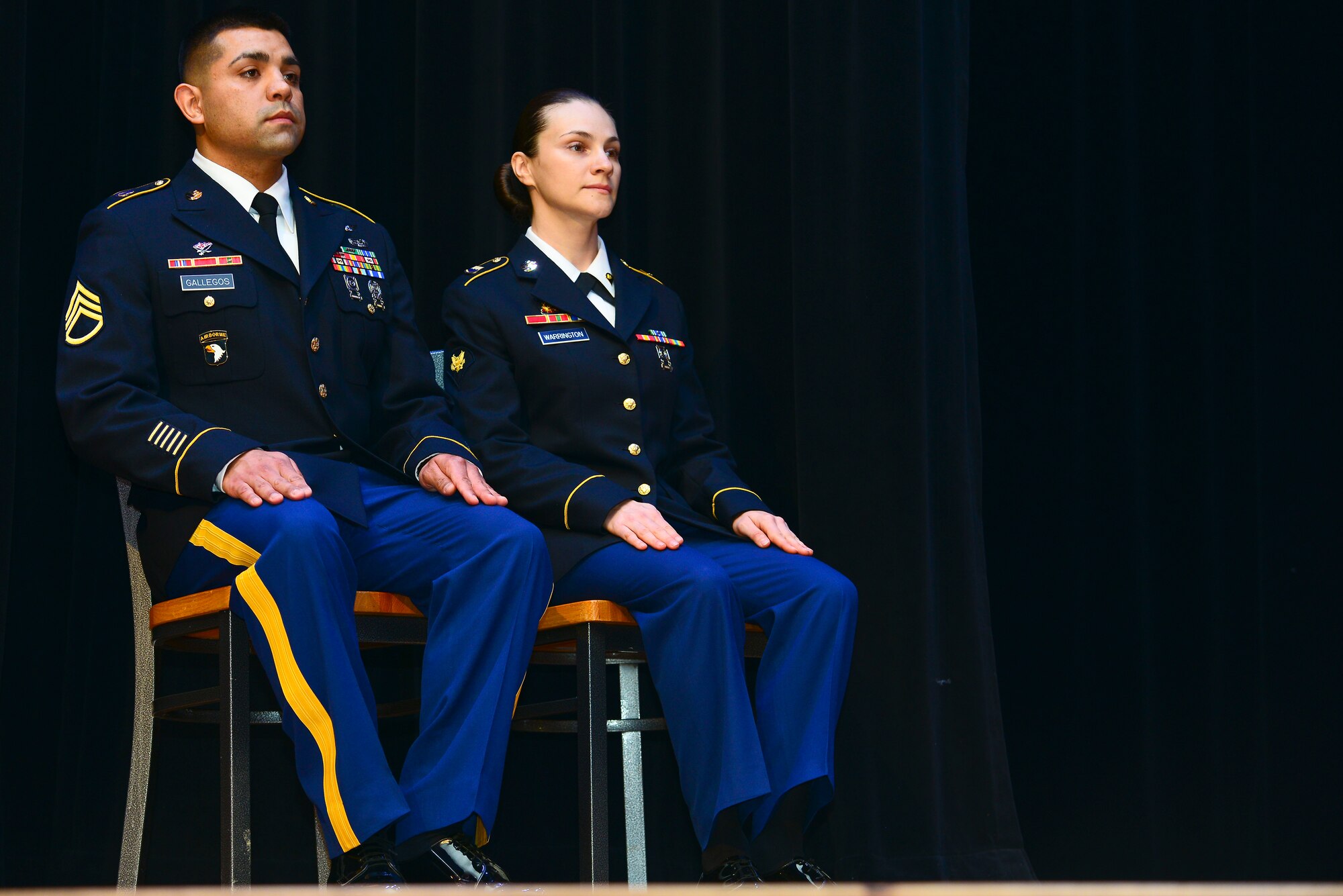 U.S. Army Staff Sgt. Francisco Gallegos, Charlie Company, 1st Battalion, 210th Aviation Regiment, 128th Aviation Brigade instructor, left, and Spc. Victoria Warrington, 331st Transportation Company (Modular Causeway System), 10th Transportation Battalion, 7th Transportation Brigade (Expeditionary) seaman, became the Joint Base Langley-Eustis noncommissioned officer and Soldier of the year at Fort Eustis, Va., March 23, 2015. The two competed against 40 other Soldiers to earn the titles and were selected based on physical training standards and board and written test results. (U.S. Air Force photo by Senior Airman Kimberly Nagle/Released)
