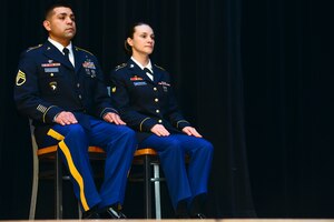 U.S. Army Staff Sgt. Francisco Gallegos, Charlie Company, 1st Battalion, 210th Aviation Regiment, 128th Aviation Brigade instructor, left, and Spc. Victoria Warrington, 331st Transportation Company (Modular Causeway System), 10th Transportation Battalion, 7th Transportation Brigade (Expeditionary) seaman, became the Joint Base Langley-Eustis noncommissioned officer and Soldier of the year at Fort Eustis, Va., March 23, 2015. The two competed against 40 other Soldiers to earn the titles and were selected based on physical training standards and board and written test results. (U.S. Air Force photo by Senior Airman Kimberly Nagle/Released)