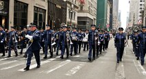 Instrumentalists with the Air National Guard Band of the Northeast perform in the New York City St. Patrick's Day Parade in New York March 17, 2015. The band played for spectators along the parade’s Fifth Avenue route as part of its community relations mission. (U.S. Air National Guard photo by Staff Sgt. Lealan Buehrer/Released)