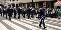 U.S. Air Force Senior Master Sgt. John E. Christ, drum major with the 553rd Air Force Band, leads the Air National Guard Band of the Northeast during a performance in the New York City St. Patrick's Day Parade in New York March 17, 2015. The band played for spectators along the parade’s Fifth Avenue route as part of its community relations mission. (U.S. Air National Guard photo by Staff Sgt. Lealan Buehrer/Released)