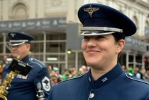 U.S. Air Force Tech. Sgt. Peggy K. Miller, an instrumentalist with the 566th Air Force Band, performs with the Air National Guard Band of the Northeast in the New York City St. Patrick's Day Parade in New York March 17, 2015. The band played for spectators along the parade’s Fifth Avenue route as part of its community relations mission. (U.S. Air National Guard photo by Staff Sgt. Lealan Buehrer/Released)