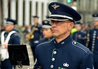U.S. Air Force Tech. Sgt. Timothy A. Hess, an instrumentalist with the 566th Air Force Band, performs with the Air National Guard Band of the Northeast in the New York City St. Patrick's Day Parade in New York March 17, 2015. The band played for spectators along the parade’s Fifth Avenue route as part of its community relations mission. (U.S. Air National Guard photo by Staff Sgt. Lealan Buehrer/Released)