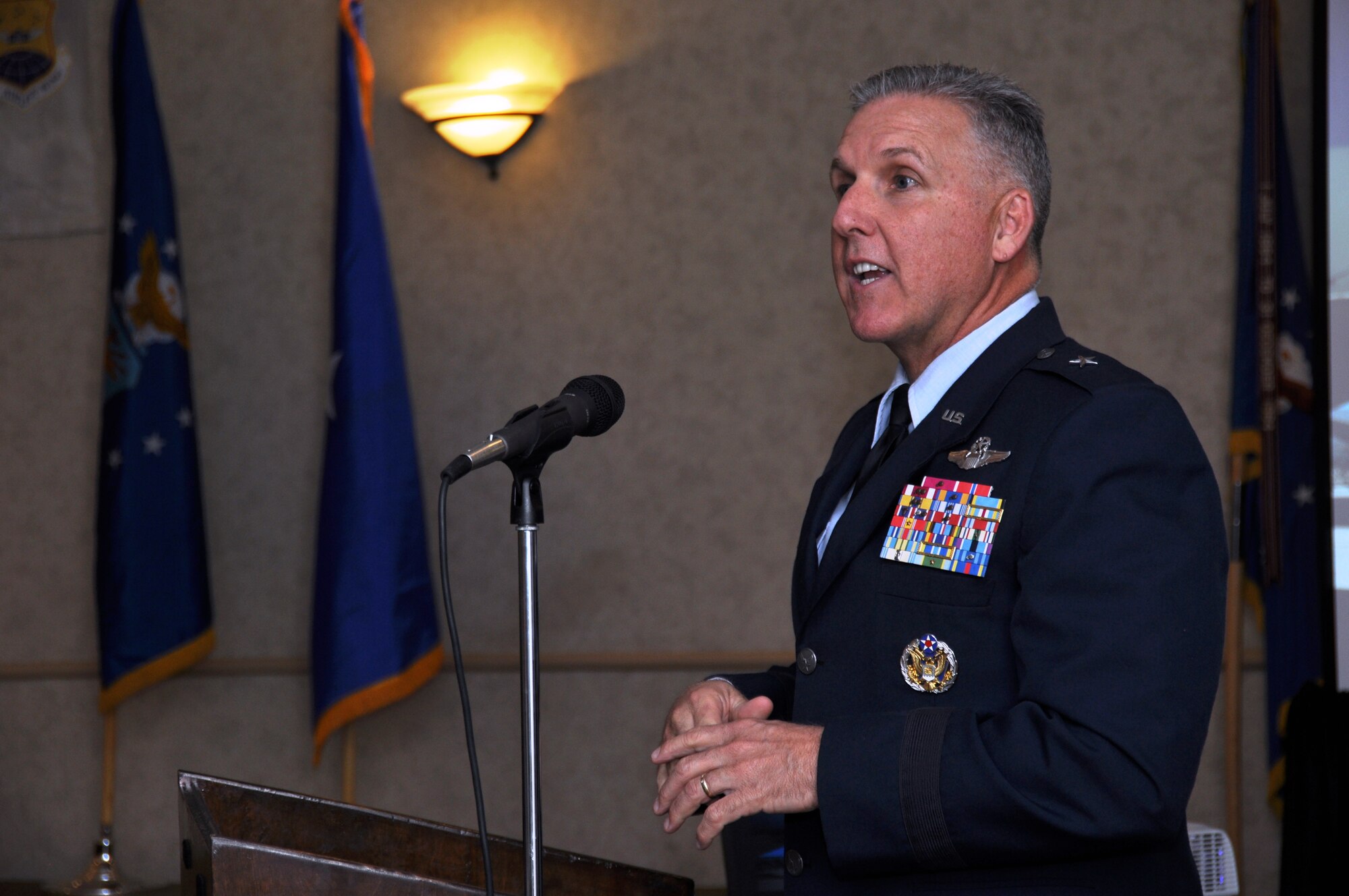 Brig. Gen. John C. Flournoy Jr., 4th Air Force commander, spoke to honorary commanders  during the 433rd Airlift Wing’s Honorary Commanders Induction Ceremony, March 7, 2015 in downtown San Antonio, on the significance of the Honorary Commanders program and its ability to provide community leaders with unique insight into the U.S. Air Force Reserves. 

"Now when they (your employees) have to go serve, you’ll know and understand what they're doing,  and that they are not just going out to the base and having a bunch of picnics and barbecues," said the general. "They are wearing chemical gear and they are making sure they are qualified to do exactly what our active duty counterparts are doing at the same standard," said Flouornoy. (U.S. Air Force Photo by Tech. Sgt. Carlos J. Trevino) 

