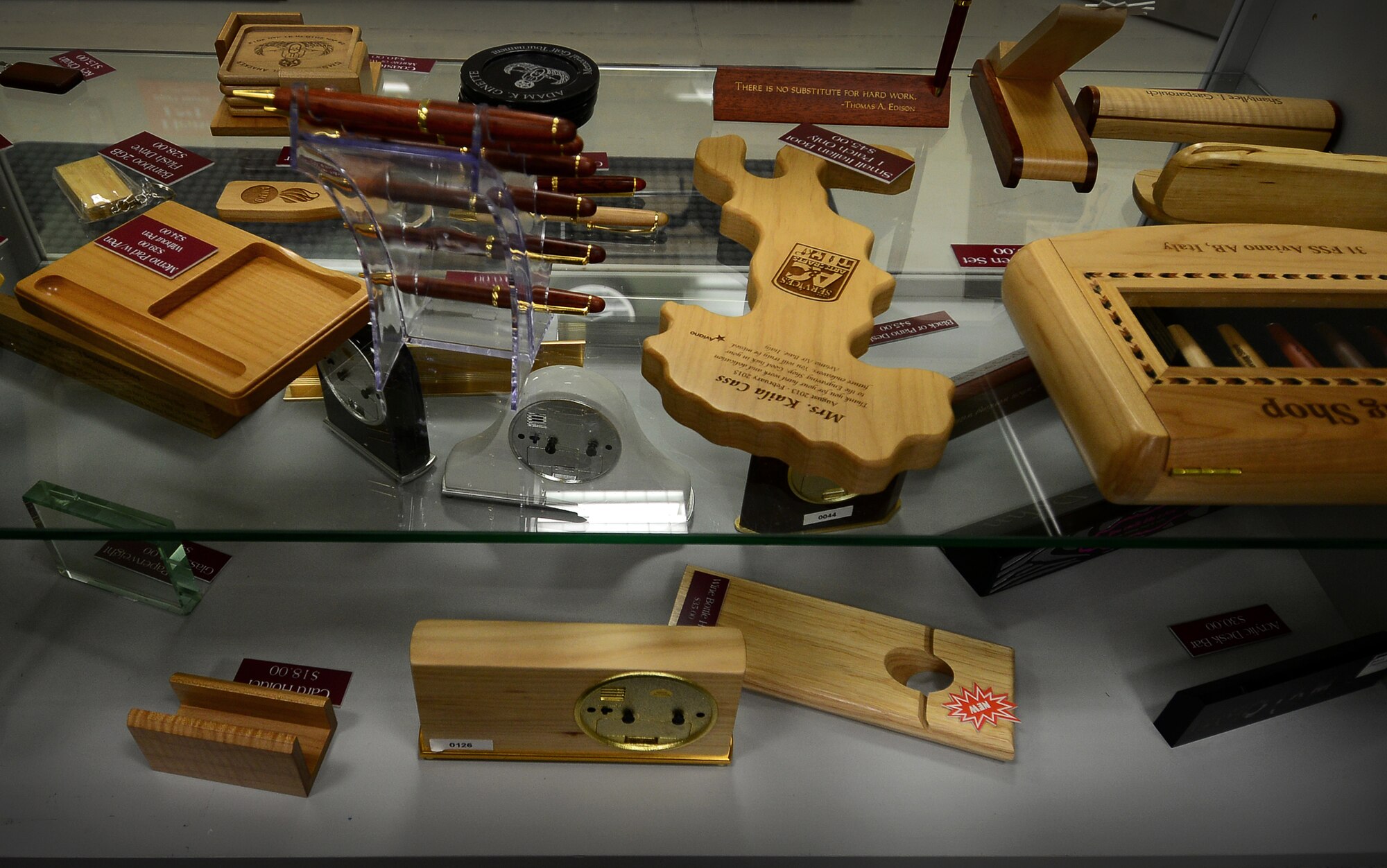 Stefano De Bortoli, 31st Force Support Squadron wood hobby shop manager, creates the majority of service member’s “going-away” gifts that can then be engraved at Aviano Air Base, Italy. The shop is part of the arts and crafts center and is open Tuesday through Saturday. (U.S. Air Force photo by Senior Airman Matthew Lotz/Released)