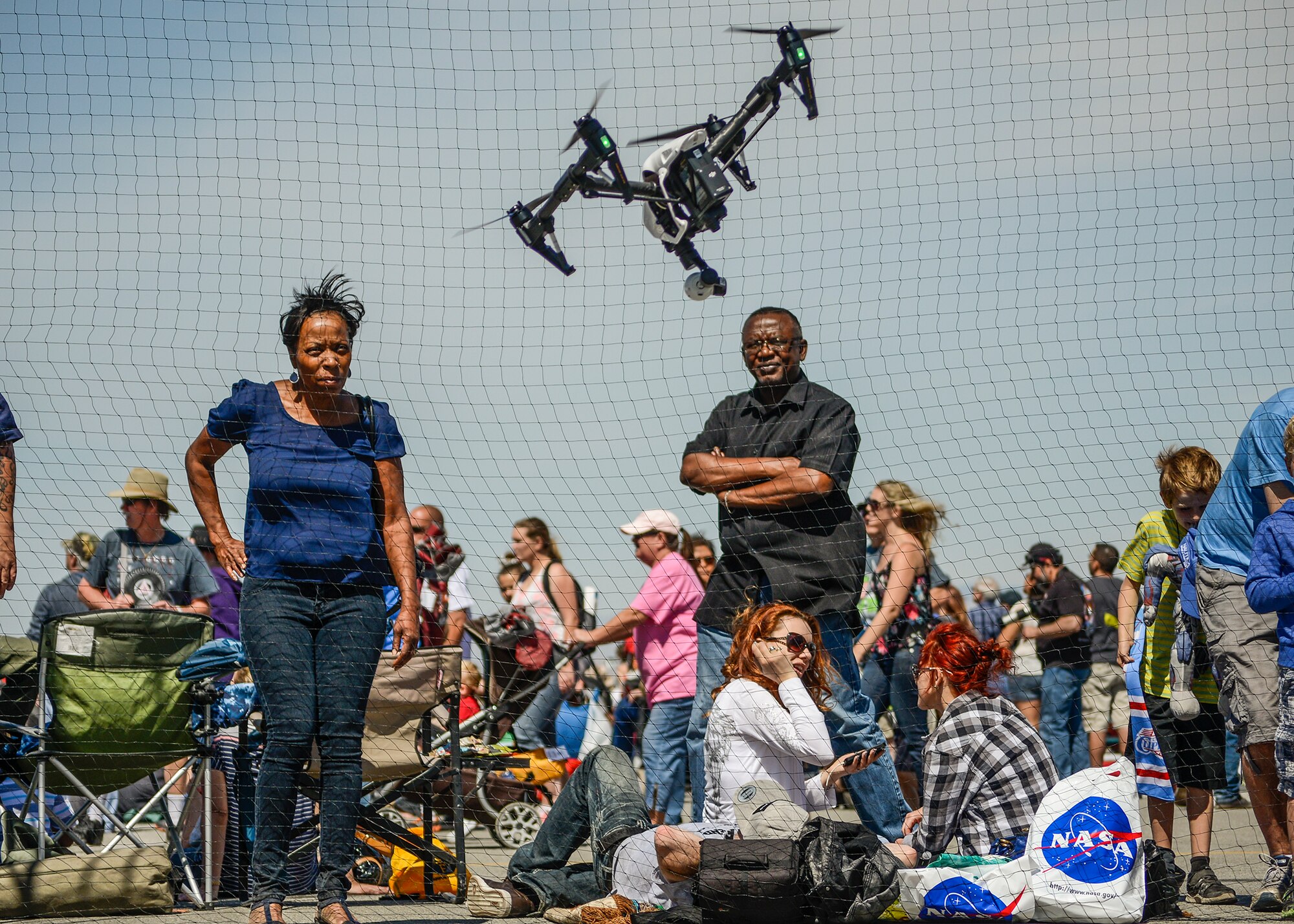 A large cage set up outside of the Science, Technology, Engineering and Math education tents was used by DroneFly and the UAV Systems Association to show off drone technology. (U.S. Air Force photo by Rebecca Amber)