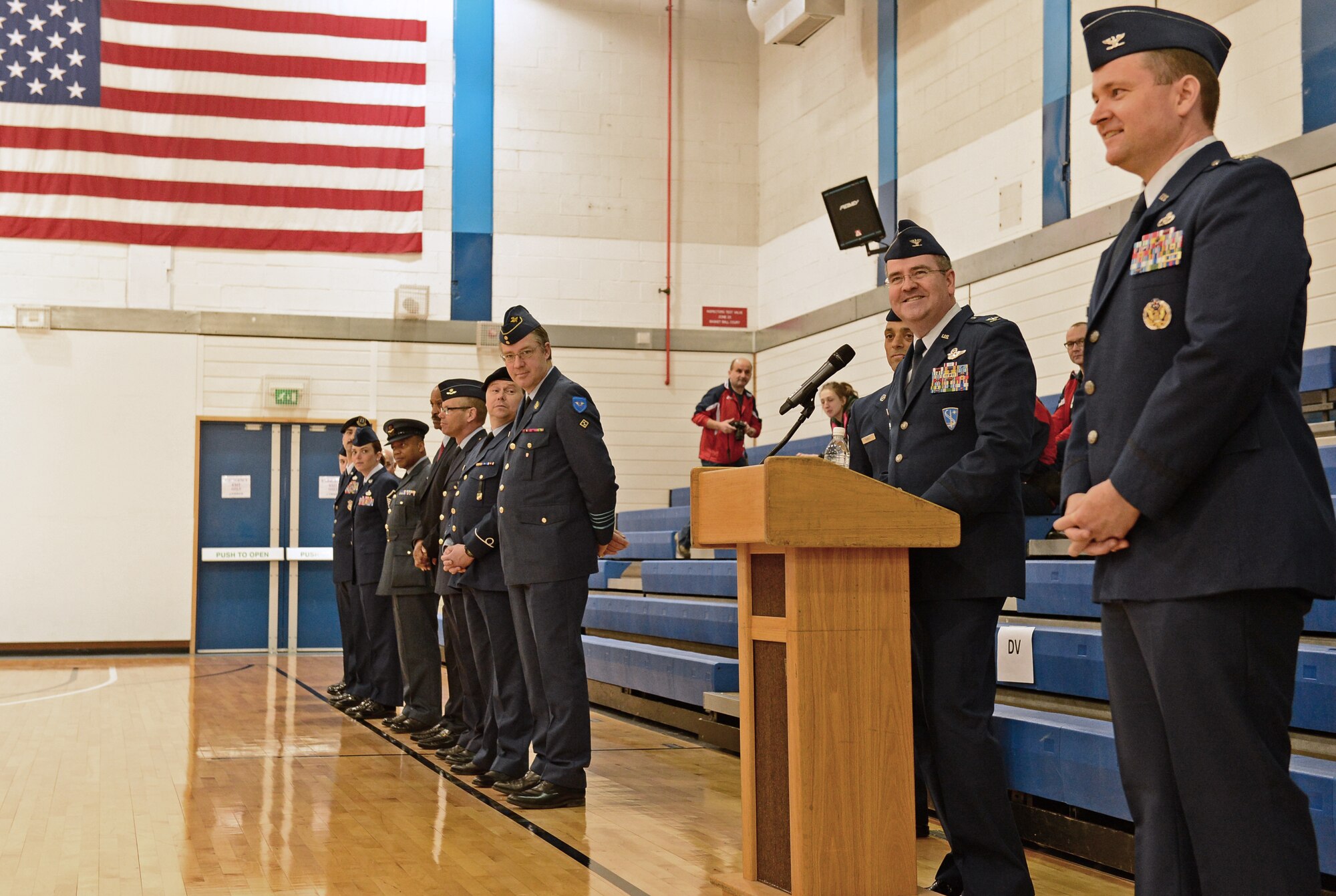 U.S. Air Force Col. Mark Hering, Headquarters Allied Air Command Base Support Group commander, addresses the basketball teams at the opening ceremony of NATO’s Inter-Nation Sports Championship at Royal Air Force Lakenheath, England, March 24, 2015. The U.S. Air Force is hosting this year’s event with participation from air forces from Belgium, Poland, Netherlands, Germany and the U.K. (U.S. Air Force photo by Airman 1st Class Erin R. Babis/Released)