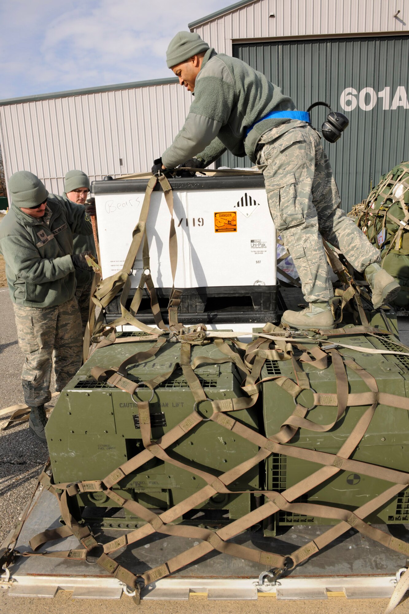 150319-Z-EZ686-074 – Airmen from the 127th Logistics Readiness Squadron load a pallet of cargo prior to loading it onto an aircraft at the Alpena Combat Readiness Training Center, Mich., March 19, 2015. The 127th LRS, home-stationed at Selfridge Air National Guard Base, provides aerial port services to military units across the state of Michigan.  (U.S. Air National Guard photo by Master Sgt. David Kujawa) 