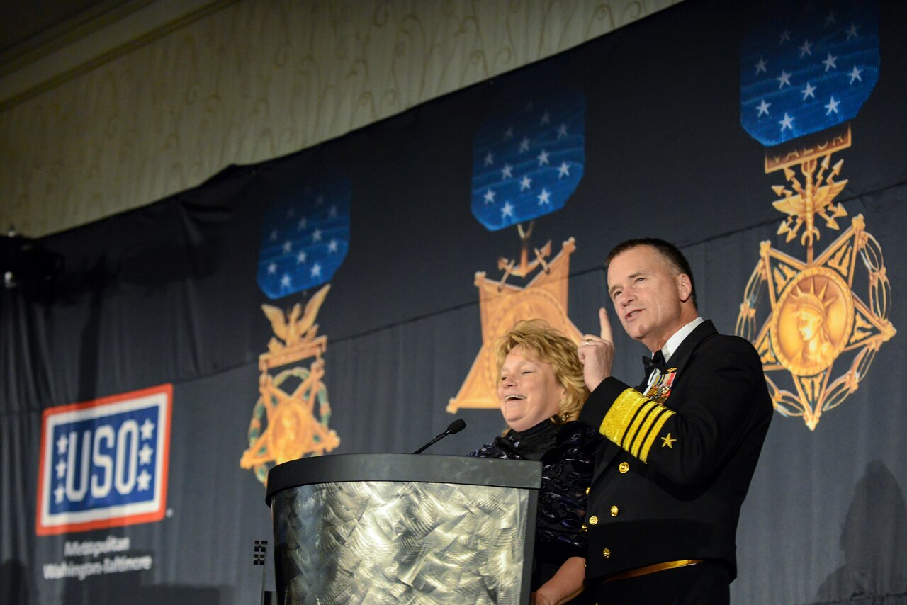 Navy Adm. James A. Winnefeld Jr., vice chairman of the Joint Chiefs of Staff, and his wife, Mary, speak before an audience of about 600 during the USO of Metropolitan Washington-Baltimore’s 33rd awards dinner in Arlington, Va., March 24, 2015. The Winnefelds and the Joint Chiefs of Staff honored the nation's Medal of Honor recipients on the eve of National Medal of Honor Day. DoD photo by U.S. Air Force Master Sgt. Nathan Gallaha