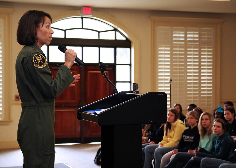 Maj. Christina "Thumper" Hopper, from the 71st Flying Training Wing at Vance Air Force Base, Oklahoma, speaks to Charleston area high school girls at the 8th Annual Joint Base Charleston Women in Aviation Career Day. Hopper was the first African-American female fighter pilot to fly combat missions during a major war. She shared stories of her overcoming adversity and challenges early in her life, and challenged the girls to be anything they want to be. (U.S. Air Force Photo / Michael Dukes)
