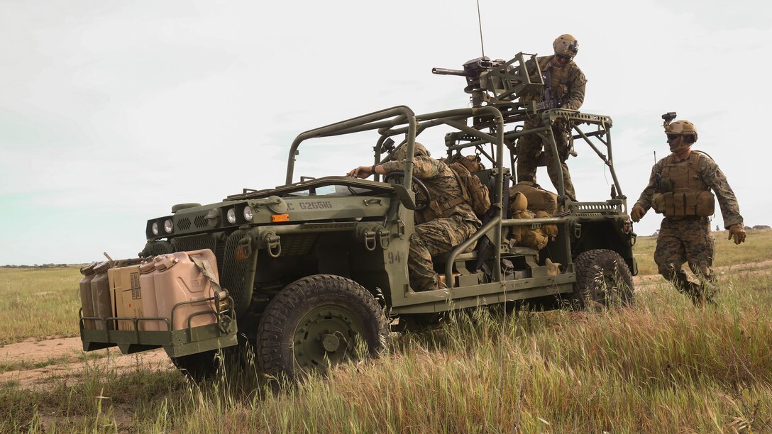 Marines with Force Company, 1st Reconnaissance Battalion, 1st Marine Division, establish radio connection with their battlefield commander during a training exercise aboard Marine Corps Base Camp Pendleton, Calif., March 16, 2015. With the information gathered by reconnaissance Marines, a battlefield commander can make properly informed decisions during a mission.