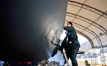 Royal Australian Air Force Squadron Leader Andrew Jackson, F-35 Lightning II student pilot, climbs into an F-35A before his first flight on Eglin Air Force Base, Fla., March 18, 2015. Jackson arrived in the United States in December 2014 and started his training at the F-35 Academic Training Center on Jan. 26, Australia Day. Since then, Jackson has completed 154 classroom hours and 64 hours throughout 16 flight simulations, before stepping to his first aircraft. (U.S. Air Force photo/Staff Sgt. Marleah Robertson)
