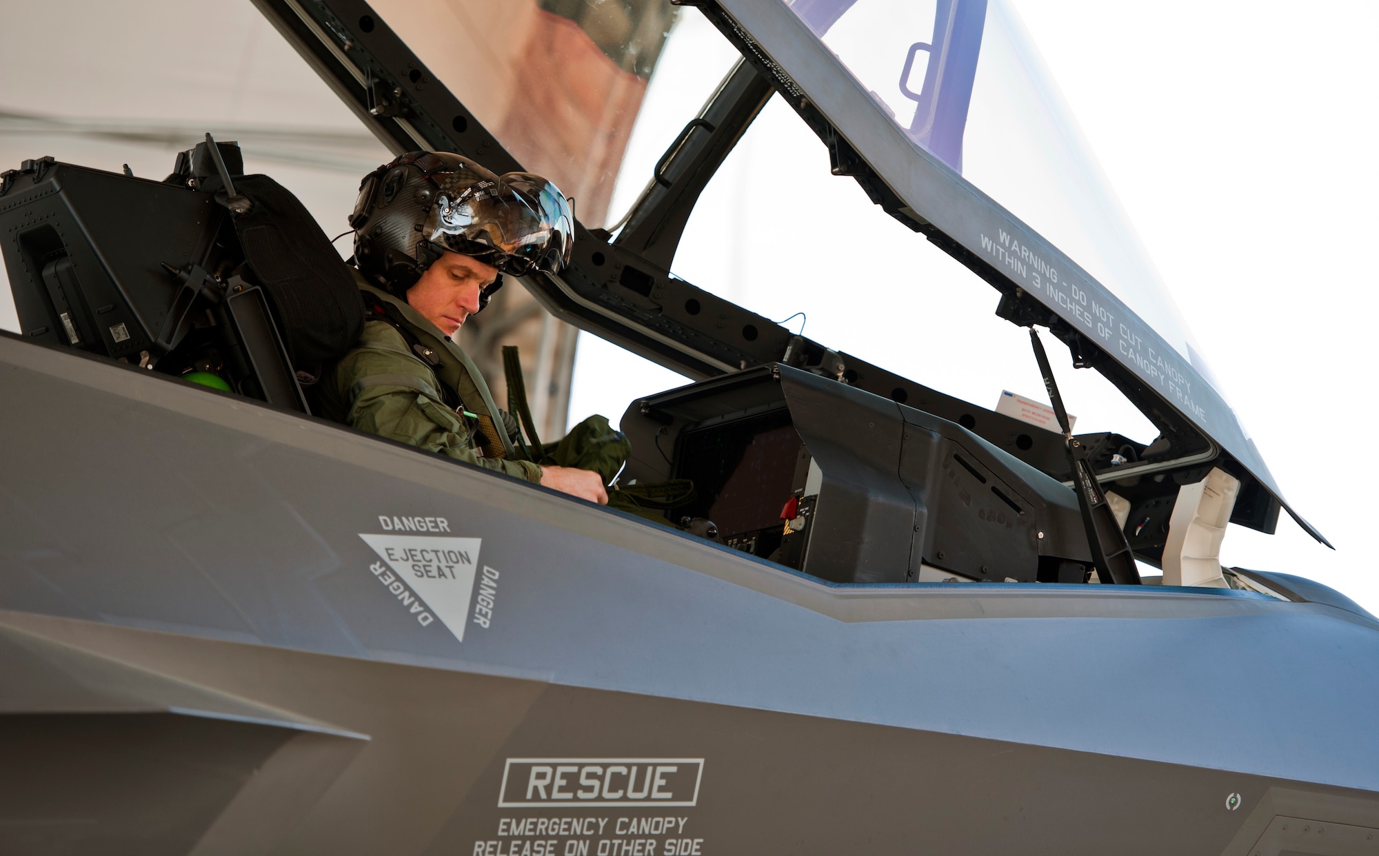 Royal Australian Air Force Squadron Leader Andrew Jackson, F-35 Lightning II student pilot, prepares for his first flight in an F-35A on Eglin Air Force Base, Fla., March 18, 2015. After Jackson completes his training at Eglin AFB, he will go to Luke Air Force Base, Ariz., to be in instructor pilot at the international pilot center. (U.S. Air Force photo/Staff Sgt. Marleah Robertson)