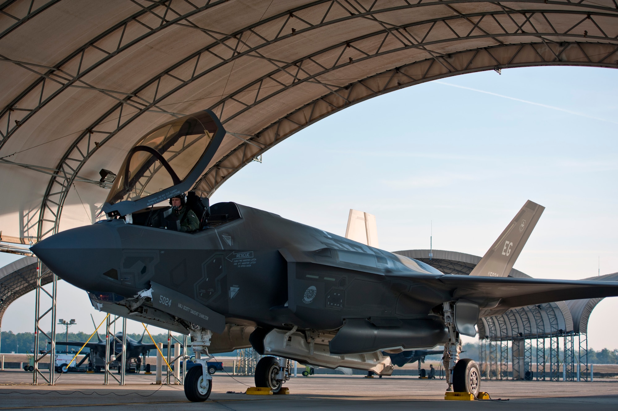 Royal Australian Air Force Squadron Leader Andrew Jackson, F-35 Lightning II student pilot, prepares for his first flight in an F-35A on Eglin Air Force Base, Fla., March 18, 2015. After Jackson completes his training at Eglin AFB, he will go to Luke Air Force Base, Ariz., to be in instructor pilot at the international pilot center. (U.S. Air Force photo/Staff Sgt. Marleah Robertson)