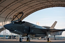 Royal Australian Air Force Squadron Leader Andrew Jackson, F-35 Lightning II student pilot, prepares for his first flight in an F-35A on Eglin Air Force Base, Fla., March 18, 2015. After Jackson completes his training at Eglin AFB, he will go to Luke Air Force Base, Ariz., to be in instructor pilot at the international pilot center. (U.S. Air Force photo/Staff Sgt. Marleah Robertson)